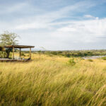 What Accommodations Are Recommended Near Serengeti and Maasai Mara During Migration Season?